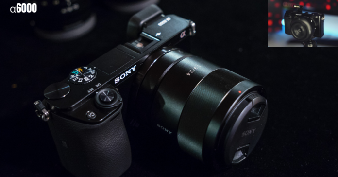 Image of a Sony α6000 camera with an open guidebook beside it, representing the comprehensive guide to the camera.